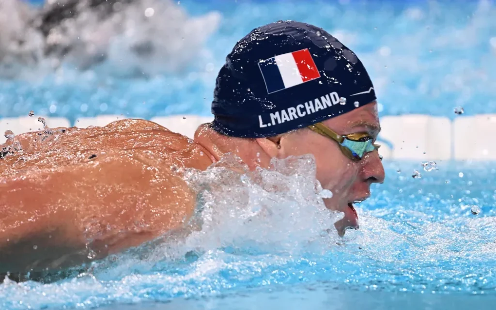 French swim star Marchand makes Olympic history with 'golden double'