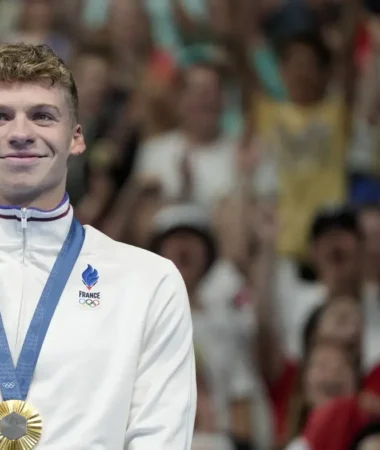 French swim star Marchand makes Olympic history with 'golden double'